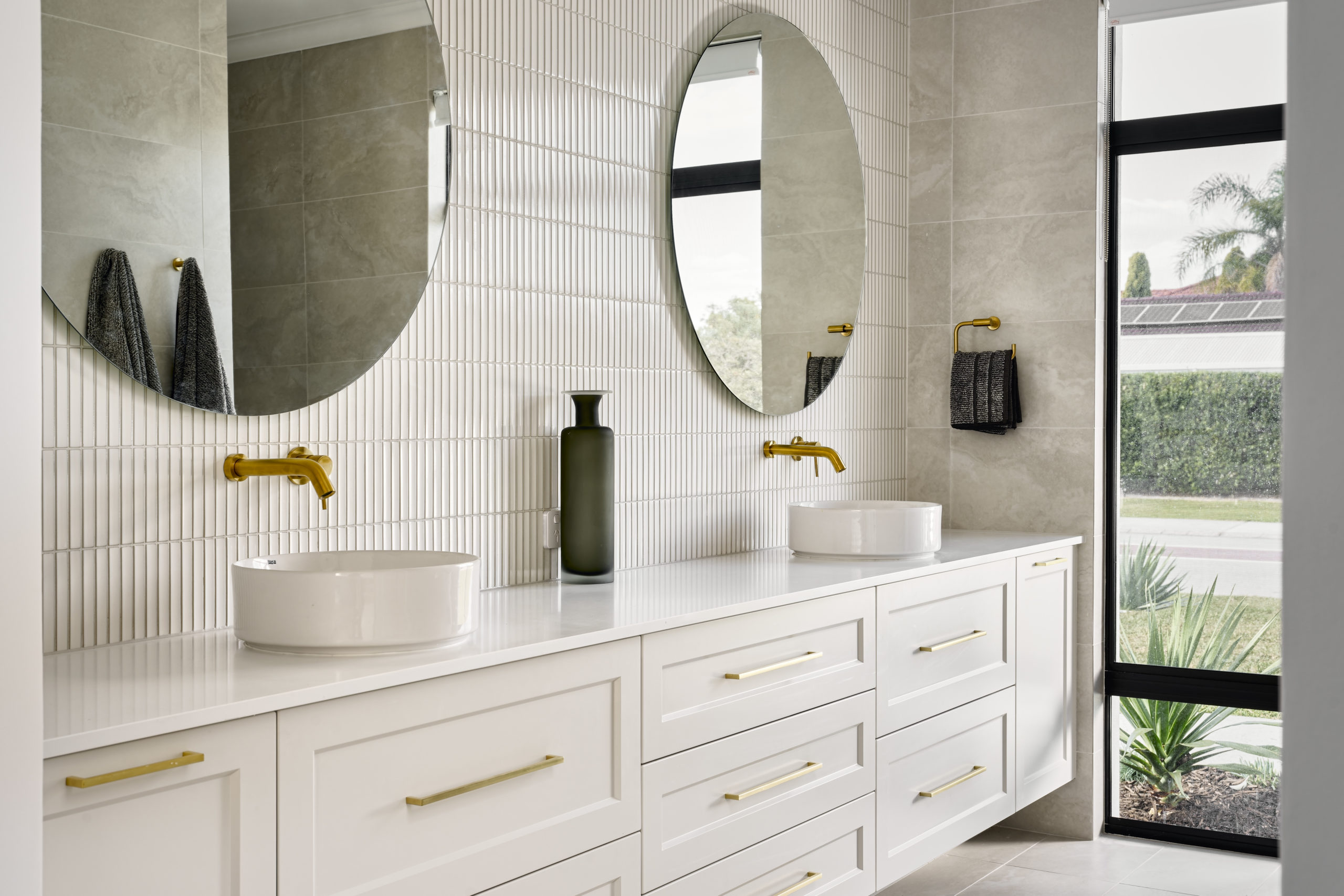 Bathroom with circular mirrors